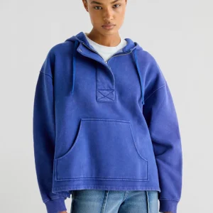 SUDADERA LAVADA CALAVERA TACHUELAS